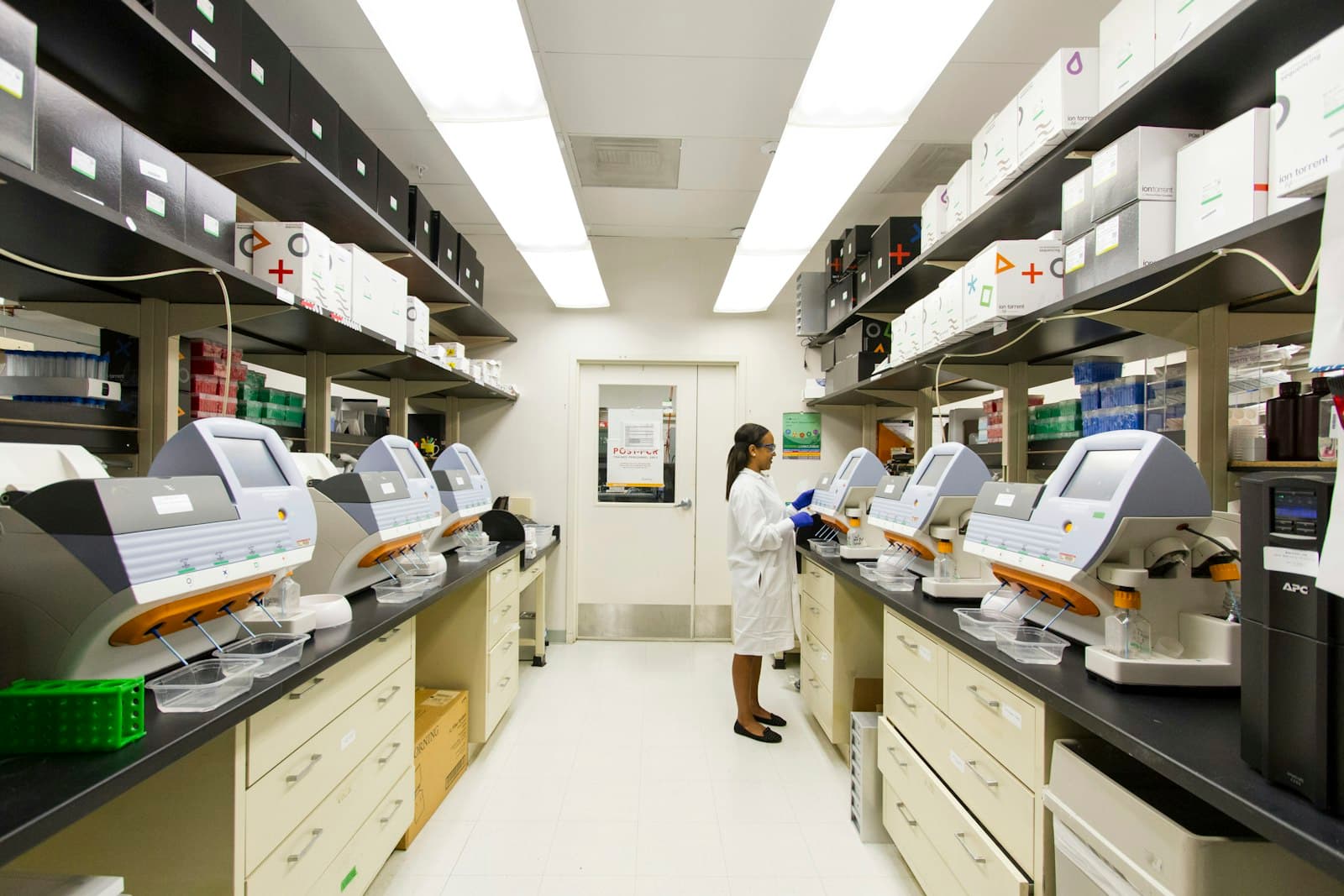 Automated analyzer lab with a scientist at work